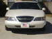 1997 Lincoln Mark VIII - Front view of a white 1997 Lincoln Mark VIII, its distinctive grille and headlights.