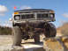 1979 Ford Bronco - This lifted 1978 Ford Bronco navigates a rocky obstacle course, its off-road capabilities.