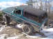 1979 Ford Bronco - This 1979 Ford Bronco navigates a challenging off-road course with large tires and a lifted suspension.