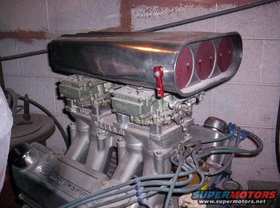 Ford Motorsport engine valve cover with a chrome air scoop and dual carburetors
