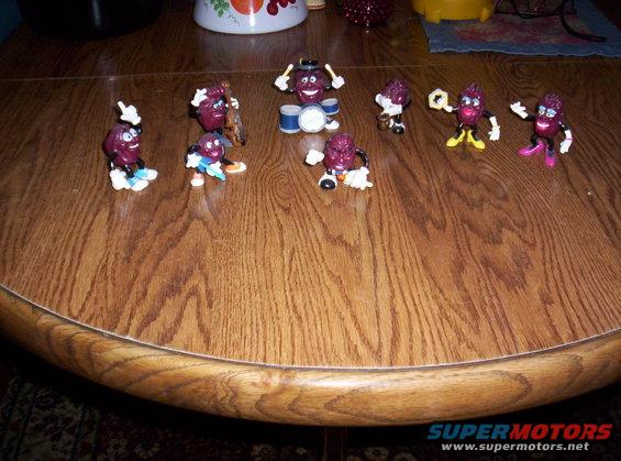 California Raisins toys on a wooden table