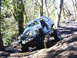 1990 Ford Bronco - This heavily modified SUV navigates a challenging muddy off-road course, its off-road capabilities.