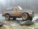 1991 Ford Bronco - This 1991 Ford Bronco is covered in mud after driving off-road.