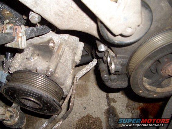 close-up of engine pulley and associated components