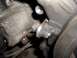 1992 Ford Crown Victoria - A detailed view of an engine component, showing mechanical connections and textured surfaces.