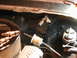 1968 Ford Mustang - Close-up view of engine components including spark plugs, an air filter, and a fuel filter.