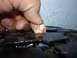 1985 Ford Bronco - Checking tire tread depth with a penny. The date on the penny is 2002.