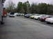 1998 Volkswagen Jetta - Several Volkswagen Jettas are parked in a lot, with one in the foreground having its hood open.