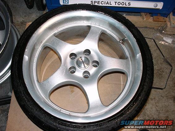 Silver Borbet wheel with tire