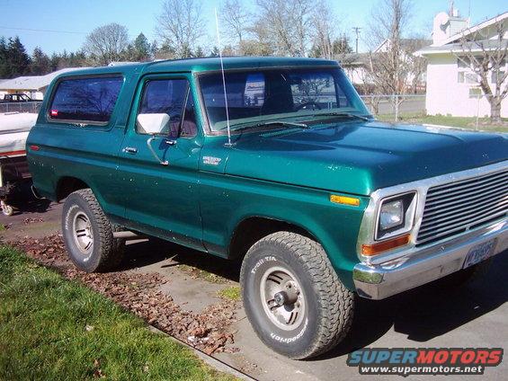 Green 1978 Ford Bronco parked outside