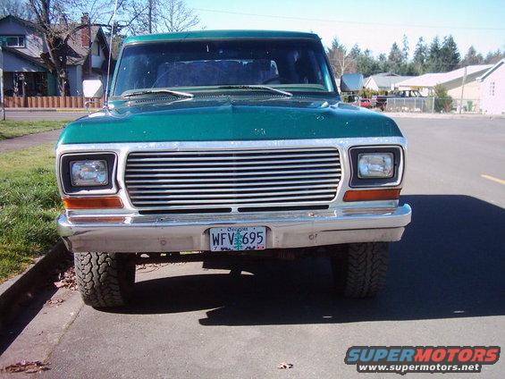 Green 1978 Ford Bronco front view with chrome grille and Oregon license plate WFV 695