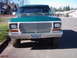 1978 Ford Bronco - The front of a green 1978 Ford Bronco is shown parked on a street.