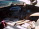 1978 Ford Bronco - The engine bay of a vehicle, showing the V8 engine and associated components.