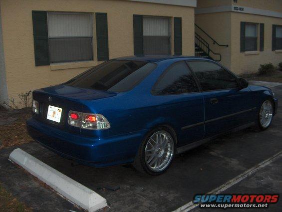 1997 Honda Civic coupe, blue, aftermarket wheels, parked