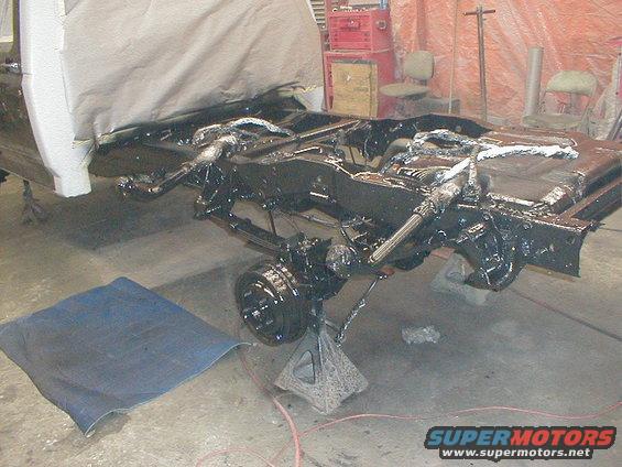 1991 Ford F-150 frame with black paint and custom flames detail