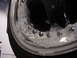 1998 Volkswagen Jetta - A car wheel is being cleaned, with soap bubbles obscuring the lug nuts.