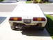 1978 Ford Mustang II - Rear view of a white 1978 Ford Mustang II Cobra, showing its taillights and license plate.
