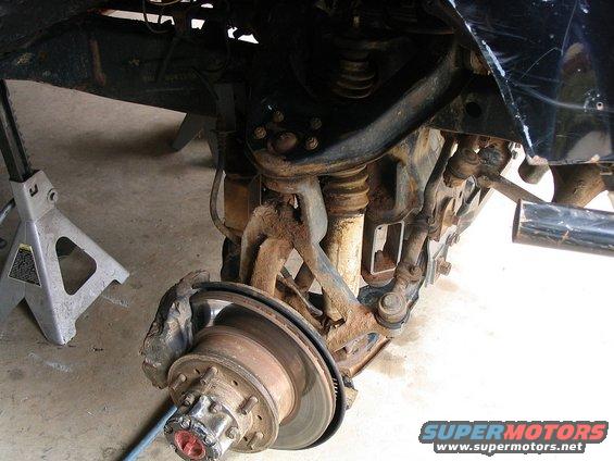 Front suspension and wheel assembly of a 1986 Ford F-150