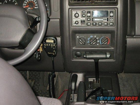 Early mounting location for the Cobra 75 WX ST handset.  I later moved it into the panel directly above where it's mounted in this photo.  Audio output was much improved, and it was easier to get at the controls while driving.