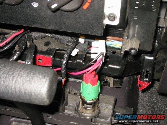 04--electrical-splice.jpg Detail showing location of splice for power to the transmitter.  I chose to splice in to the 12V power connector rather than the cigarette lighter as I wanted to be able to use the radio with the engine switched off if necessary.