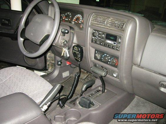 05--all-done.jpg The end result.  I later moved the mounting location for the handset into the panel directly above where it's mounted in this photo.  Audio output was much improved, and it was easier to get at the controls while driving.