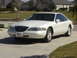 1997 Lincoln Mark VIII - 1997 Lincoln Mark VIII coupe shown from the front three-quarter view on a sunny day.