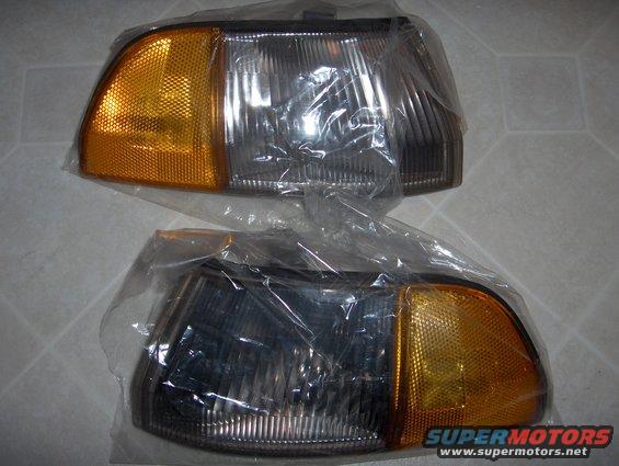 Two new car turn signal lights in plastic packaging