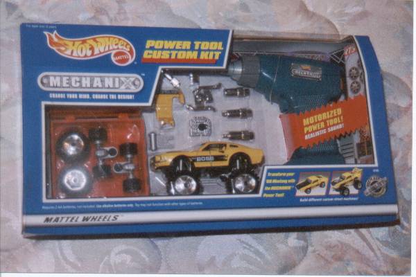 Hot Wheels Mechanix Power Tool Custom Kit box with a yellow toy car and a blue power tool