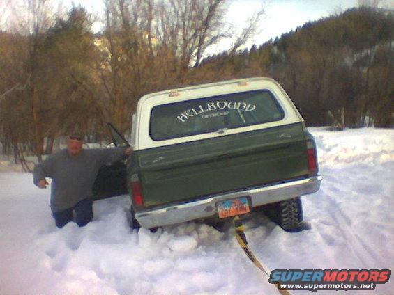 James next to his Blazer in all most waist high snow.