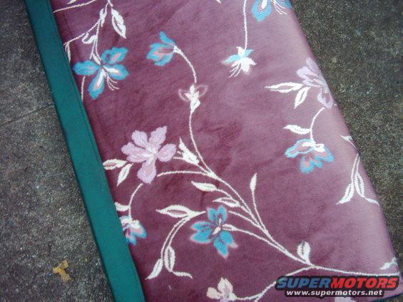 rearl001.jpg Continueing with the restoration process I have begun recovering the seats. The fabric I used I had actually found 5 years ago for another project, but never used it. I know its very girly, but at a cost of $7 for 21 feet of fabric you can't complain......and I am a girl! 

I think it looks great! 
What do you think.