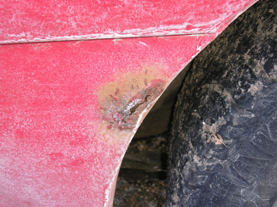 Red fender and tire detail