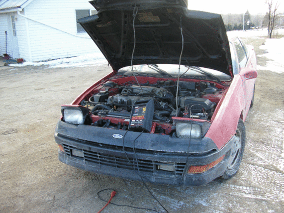 1990 Ford Probe front view, hood open showing engine bay