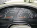 2002 Lincoln Town Car - Dashboard gauges including tachometer, speedometer, fuel, and temperature indicators.