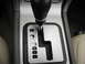 2002 Lincoln Town Car - Interior view of a car's automatic transmission shifter and console.