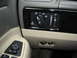 2002 Lincoln Town Car - Close-up of the dashboard reveals the light controls and auxiliary power outlets.