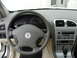 2002 Lincoln Town Car - Interior view of a 2002 Lincoln Town Car, highlighting the dashboard and steering wheel details.