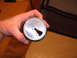 1988 Ford Bronco - An aluminum can top is held in a hand, revealing the pull tab opening.