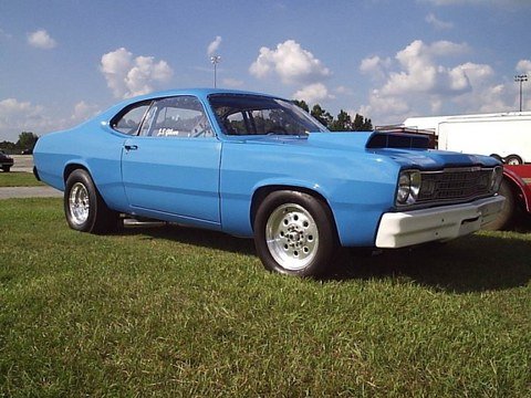 Blue drag car with scoop and racing wheels, 3/4 front view