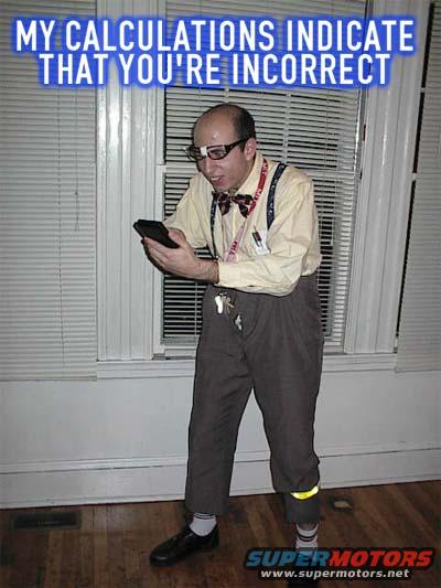 Man in glasses, bow tie, and suspenders holding a calculator