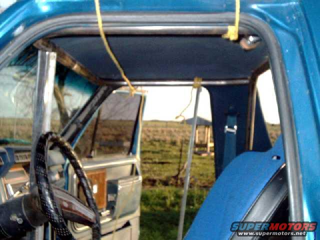 cagekit27.jpg I used rope and braces to hold up the roof hoop while fitting it to main hoop. Take your time with this step!