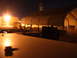1988 Ford Bronco - Nighttime view of a military installation large tents and buildings under a dark sky.