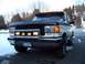 1990 Ford Bronco - This 1990 Ford Bronco is equipped with a light bar and auxiliary lights, and sports a custom license plate.