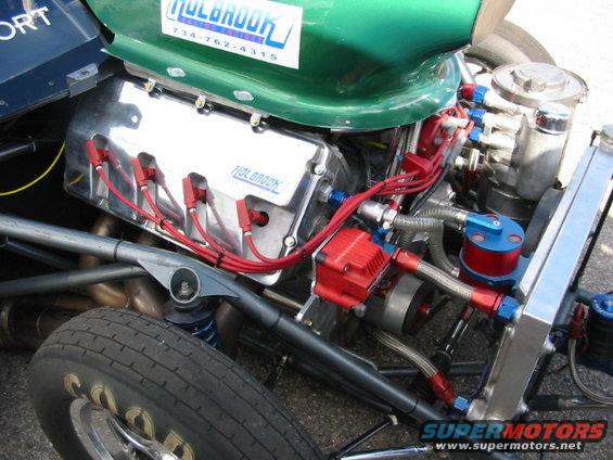 Engine bay with Holbrook valve covers and a green body panel