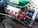 1997 Ford Crown Victoria - Custom engine bay Holbrook branded components and a prominent green body panel.
