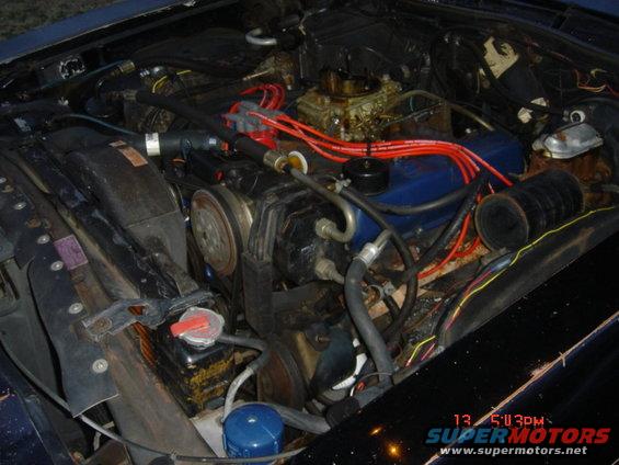 tank_04.jpg Tank on shelf in front left corner of engine compartment.