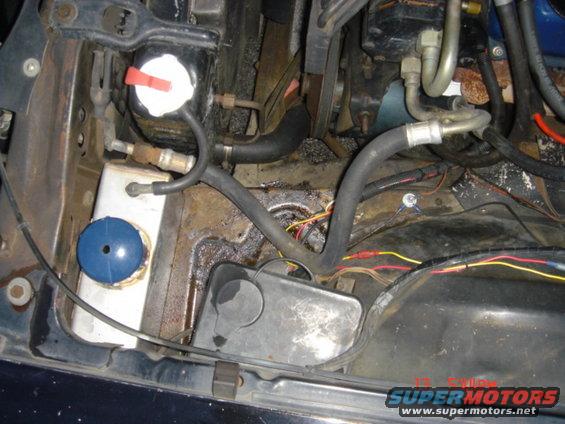 tank_05.jpg Top view of tank in front left corner of engine compartment.