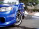 2003 Mazda Protege - Front corner view of a blue 2003 Mazda Protege during winter conditions.