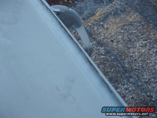My rain gutters also were beginning to crack because they were filled with bondo. Notice the crack along the top edge of the gutter. 