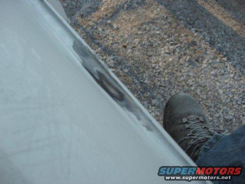 Take a look at how deep the bondo is in the rain gutter. 
