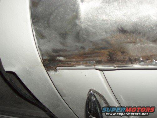 Bead of cold weld to cover crack between roof and gutter. 